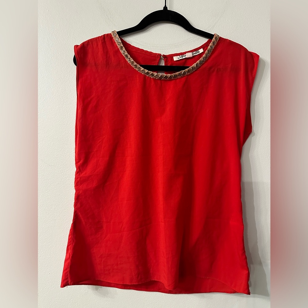 Chic Red Sleeveless Blouse with Braided Trim